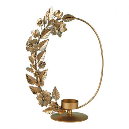 Portavelas en metal dorado